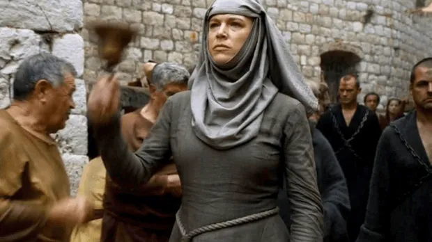 Hannah Waddingham as Septa Unella in HBO's Game of Thrones ringing a bell.